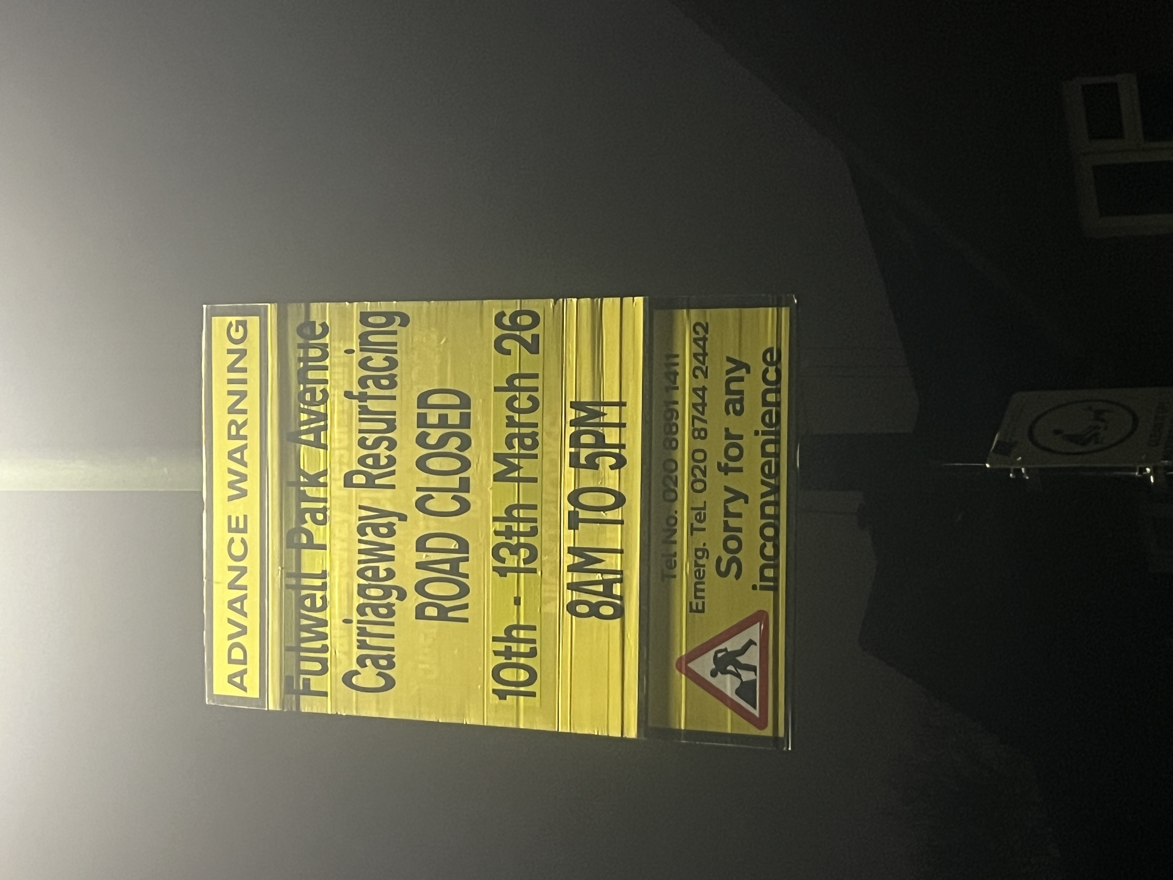 Resurfacing works notice board on Fulwell Park Avenue showing temporary waiting restrictions